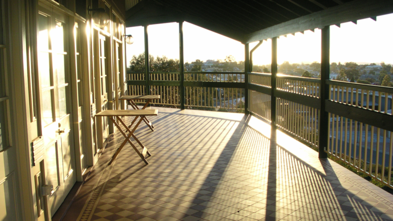 Completed verandah carpentry service in Kew, Victoria, featuring timber posts, railings and a covered outdoor living area.